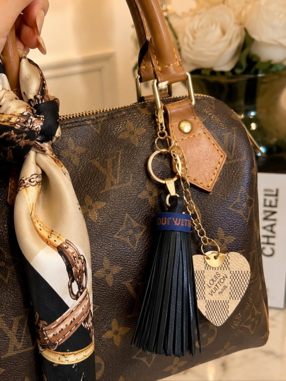 Louis Vuitton Black Leather Tassel Keyring with Gold Heart Charm and Blue Accent